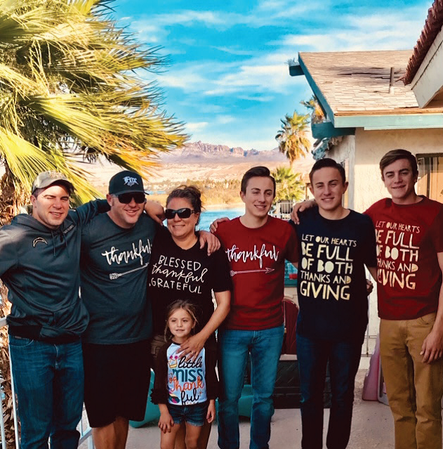 image007.png a group of people posing for a photo