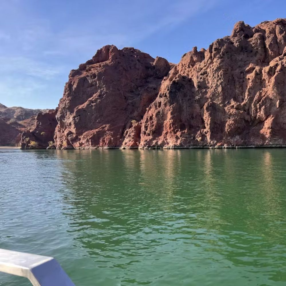 a lake with a mountain in the background
