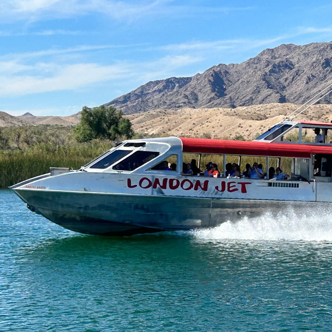 a jet boat racing down the Colorado river